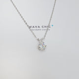 Close-up of the Bunny Glow Necklace showing the 1-carat solitaire cubic zirconia in a classic prong setting, suspended on a fine 925 sterling silver chain. The CZ captures and reflects light beautifully, offering a luxurious sparkle in a delicate design.