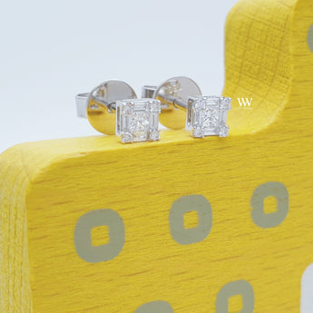 illusion setting with princess-cut, round brilliant and tapered baguette diamonds ear studs