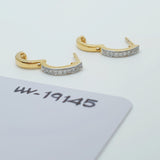 a pair of mini huggies hoops earrings set with little diamonds. 