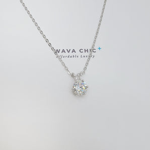 Close-up of the Bunny Glow Necklace showing the 1-carat solitaire cubic zirconia in a classic prong setting, suspended on a fine 925 sterling silver chain. The CZ captures and reflects light beautifully, offering a luxurious sparkle in a delicate design.