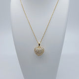 Close-up of the Apple Heart Necklace showing a heart-shaped pendant designed like an apple, paved with sparkling cubic zirconia stones. The pendant has a smooth 18K gold-plated finish, and it hangs from a sleek stainless steel chain. Crafted for durability and glamour.