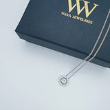 Cluster diamond pendant on White gold 18K necklace with diamond halo.