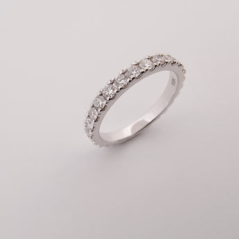 Eternity ring featuring 18 karat gold with 2 pts diamond each