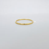 Plain solid gold ring made with 18 karat gold.